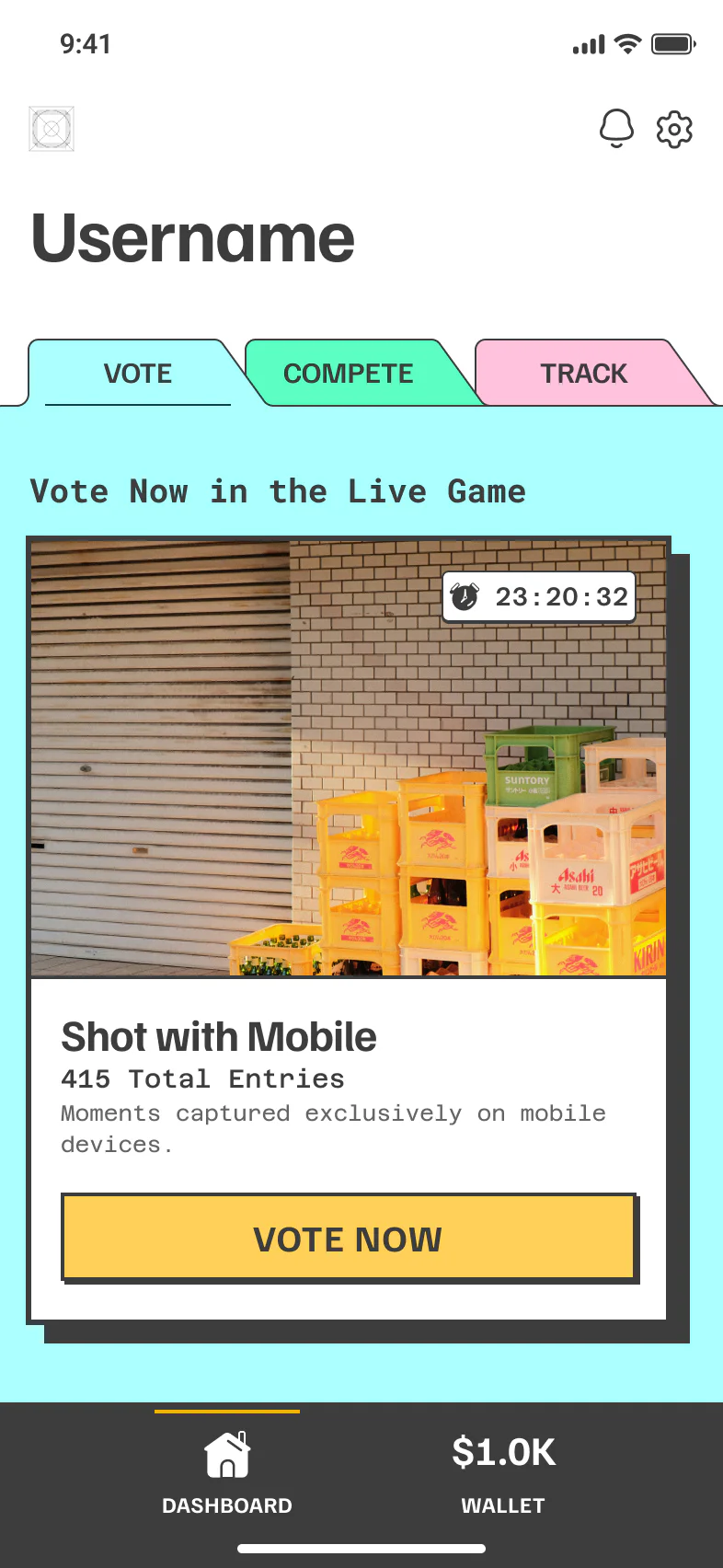 PikMe vote screen, round 3: alerts beside settings at the top, Vote, Compete and Track tabs, a Shot with Mobile contest card with a short description, and a bottom bar with Dashboard and Wallet